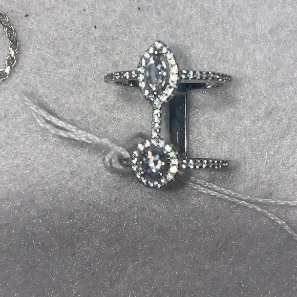 DOUBLE CONNECTED RING
STERLING SILVER MARQUE AND BRILLIANT
CUT WHITE SAPPHIRE 8 - Picture 4 of 9